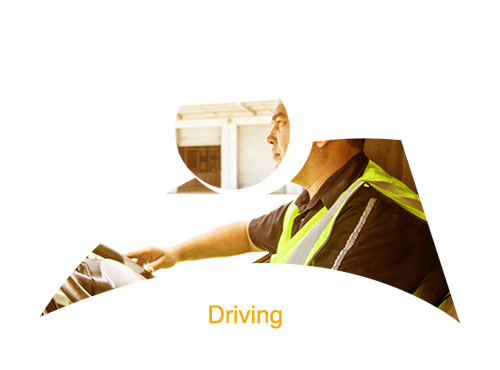 Worker in safety vest using a tablet.