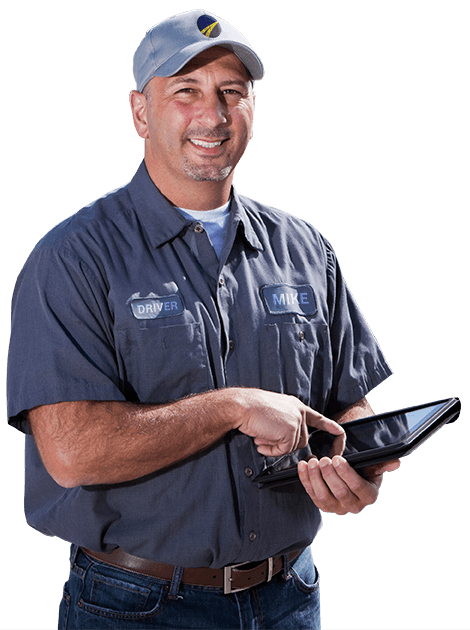 Smiling technician using a tablet in work uniform.