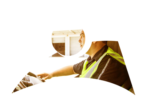 Person driving a car wearing a seatbelt and safety vest.