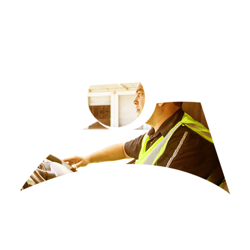 Person driving a car wearing a seatbelt and safety vest.