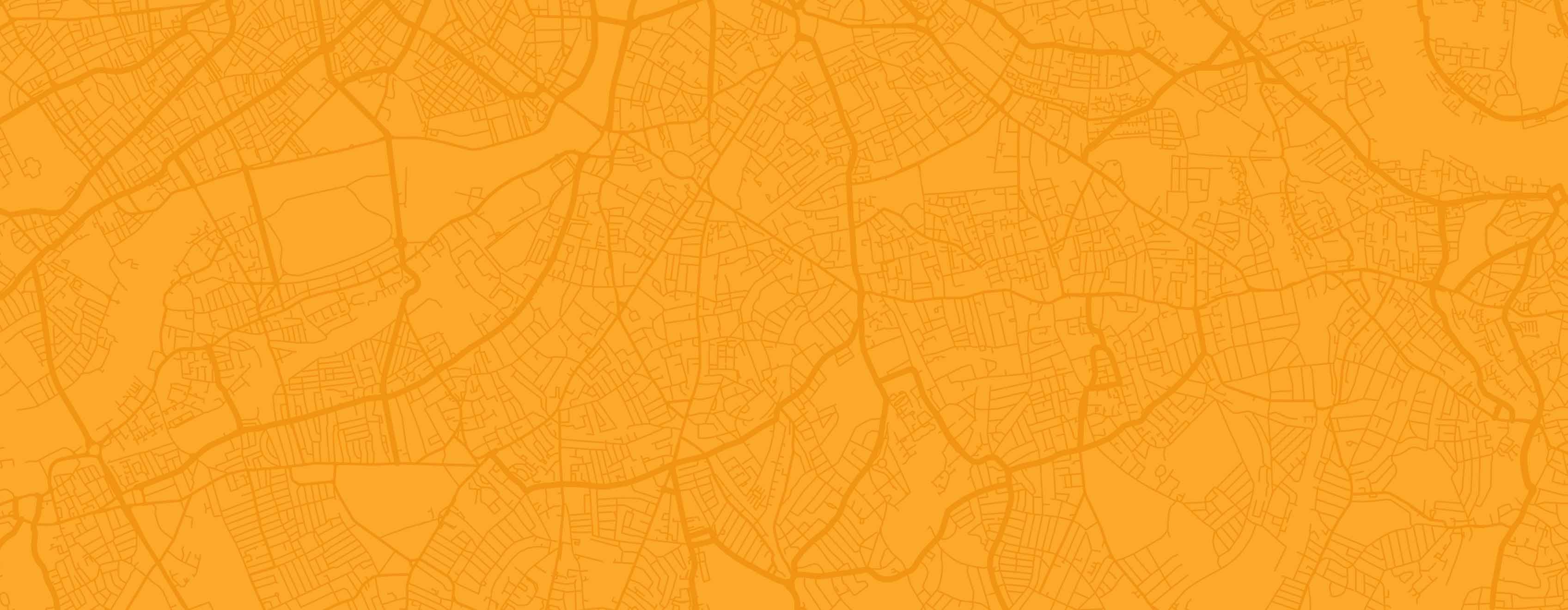 Abstract orange background with subtle leaf patterns.
